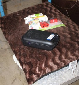 lot 256 image: Pet Lot Plush Dog bed, hair trimmer, anti-itch spray, nail trimmer