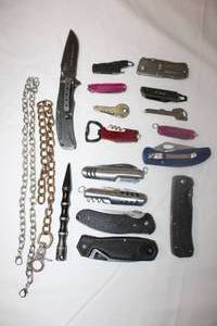 lot 153 image: Pocket knives, wrist bar, and (2) chains (Includes multi-use tools, key knives, and Sunny Service 2021)