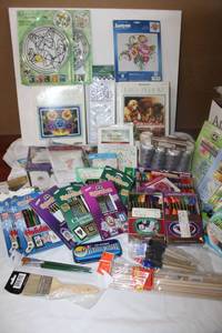 lot 176 image: Crafting lot most items unopened - embroidery floss, embroidered pillow case kits, latch hook kits, Lap stand and more
