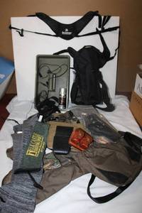 lot 191 image: Hunting gear and gun holster still in packaging