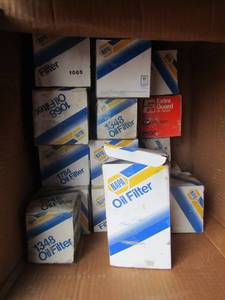 lot 15 image: Box of NAPA oil filters qty 8 plus