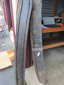 lot 25 image: Some sort of metal panels or windows panels Qty 4 -- appx 5ft long