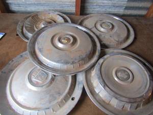lot 77 image: Vintage ford hub caps qty 5, no matches all individuals