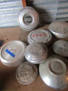 lot 79 image: Misc. lot of various brands of vintage alluminum hub caps qty 7