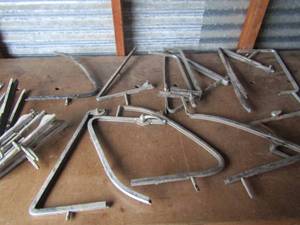 lot 81 image: BAE 5826-899-C lot of window frames for most makes and models from 1959 thru 1962