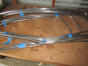 lot 97 image: Lot of rear window trim to unknown vehicle qty 10