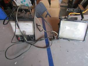 lot 132 image: Miller special battery tester vintage and a work shop light