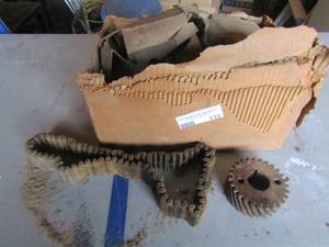 lot 135 image: Box of whitney timing chains qty 5 plus, also comes with pully