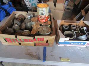lot 144 image: Cans of used Hypoid gear oil and misc. pieces for car truck
