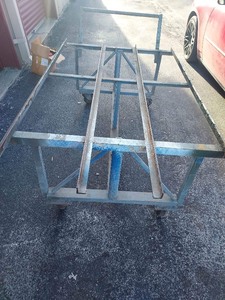 lot 2 image: LARGE METAL ROLLING CART W HANDLE  SWIEVEL WHEELS, WILL NEED NEW WHEELS SOON   85 X 46W X 29