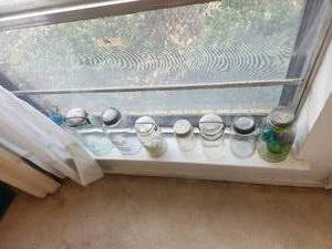 lot 14 image: Selection of vintage mason and bar jars