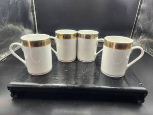 lot 28 image: Set of 4 gold trimmed porcelain coffee cups by American Atelier - Buckingham 5769