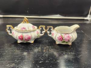 lot 34 image: Vintage porcelain cream and sugar set