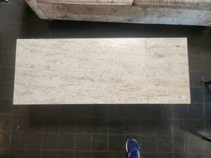 lot 194 image: Granite top coffee top - 18 x 47