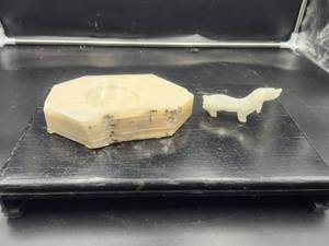 lot 212 image: Genuine Onyx ashtray and wiener dog