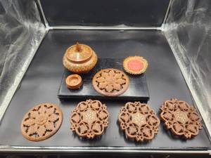 lot 223 image: Selection of hand carved wood trivets