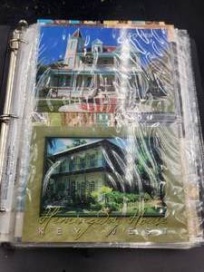 lot 236 image: Binder full of vintage postcards, some have been mailed - vintage stamps