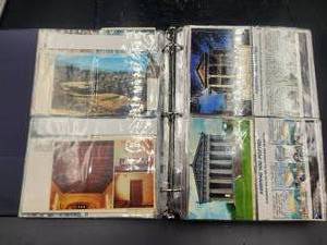 lot 247 image: Binder full of vintage postcards, some have been mailed - vintage stamps