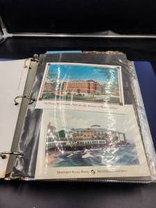 lot 242 image: Binder full of vintage postcards, some have been mailed - vintage stamps