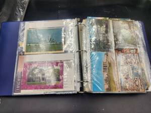 lot 241 image: Binder full of vintage postcards, some have been mailed - vintage stamps