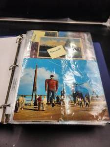 lot 240 image: Binder full of vintage postcards, some have been mailed - vintage stamps