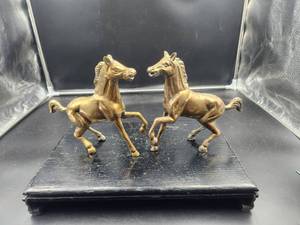 lot 254 image: Pair of brass horses