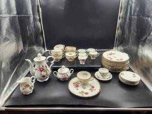 lot 314 image: Royal Rose moss rose fine China of Japan. TeaCoffee pot, creamer and sugar bowls. Coffee and teacups with plates