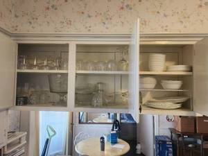 lot 284 image: Selection of dishes in cupboard