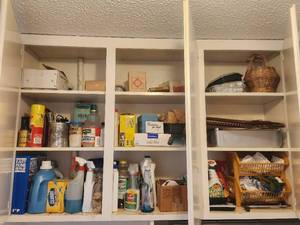 lot 320 image: Contents of cupboards above washer and dryer