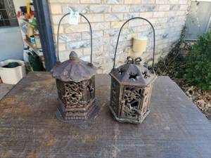 lot 344 image: Pair of vintage Pagoda cast iron candle holders
