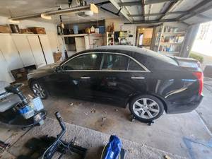 lot 1 image: 2013 Cadillac ATS - Vin# 1G6AA5RA5D0176383 - Black with black leather interior - Has not been started in a few years. No Title - Will need to apply for lost or bonded title - Sold as is.. Will need to be towed
