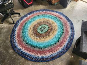 lot 48 image: Vintage round braided rug