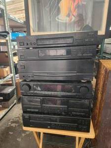 lot 72 image: Kenwood Stereo System - SS-592 Surround Sound, KT-593 Tuner, KM-993 Power amp, KC-993 Stereo Amp, KX-W893 Dual Cassette, DP-M993 Disc player