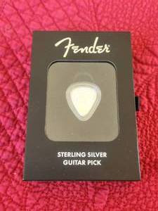 lot 8 image: Fender - Sterling Silver Guitar Pick
