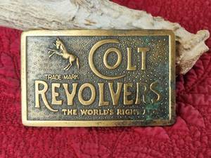 lot 95 image: Colt Revolvers brass belt buckle