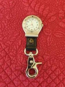 lot 113 image: Croton clip watch and compass