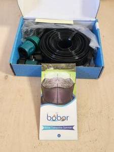 lot 244 image: Bobor trampoline sprinkler
