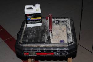 lot 23 image: Drill Master Tile Saw and Tile Adhesive