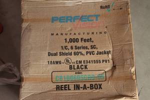 lot 77 image: Reel in a box 1,000 Feet unused coax cable