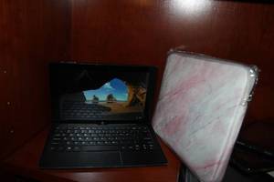 lot 72 image: Notebook has Cracked Screen and Will Need to be Factory Reset and Laptop Sleeve Pictured as Shown