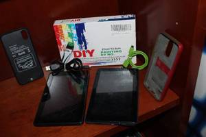 lot 84 image: 2 RCA Tablets, paint by number and phone cases as shown