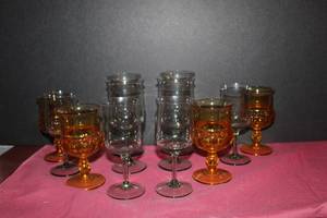 lot 111 image: Amber thumprint and Green Mist Crystal wine and water glasses pictured as shown