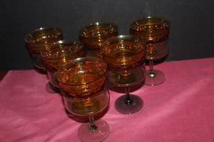 lot 113 image: Amber Thumbprint and Green Mist Crystal ChampangeCustard Glasses Pictured as Shown
