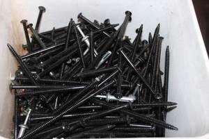 lot 125 image: Bucket of 6 inches Screws Pictured as Shown