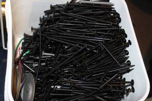 lot 127 image: Bucket of 4.25 Inch Screws Pictured as Shown
