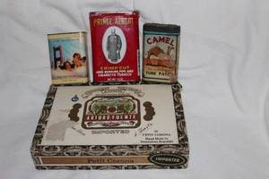 lot 131 image: Vintage Prince Albert Tin, Camel Tube Repair, Belgum Chocolate, and Cigar Box Pictured as Shown