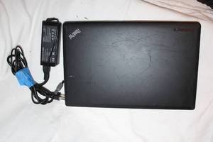 lot 145 image: ThinkPad, Needs Screen Replaced but powers on just fine