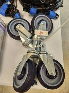lot 20 image: Set of 4 cart caster wheels - never used