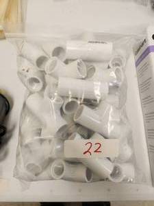 lot 22 image: Generous amount of 12 inch pvc - Tee fittings - thread on one end