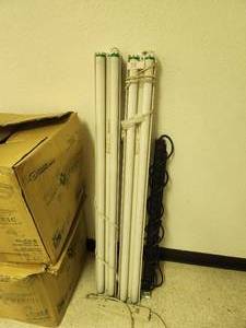 lot 58 image: Selection of 2 4 ft. fluorescent lights and multi plug tree